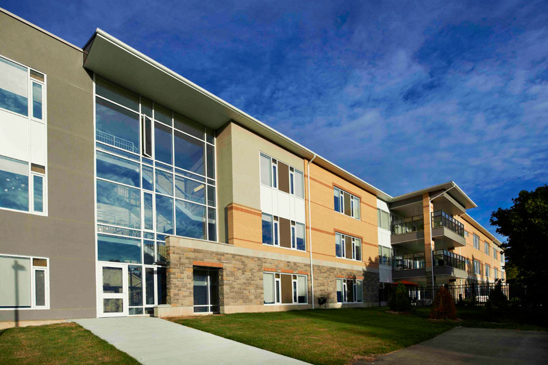 The outside of the newly renovated John Noble Home in summer.