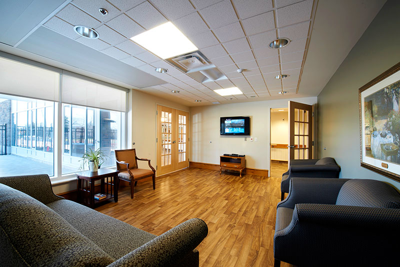 A television and visiting lounge at the John Noble Home.