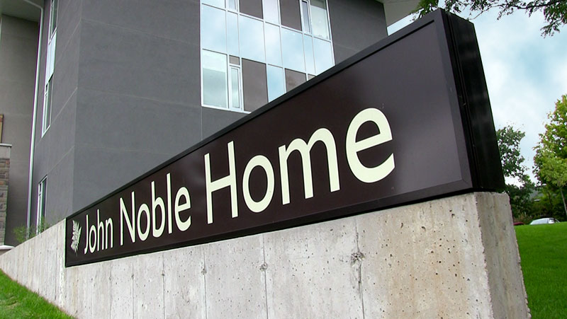 The John Noble Home driveway sign.